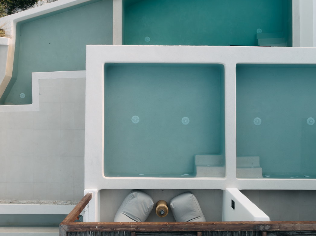 Two private plunge pools at Bard de Sol, filled with still turquoise water