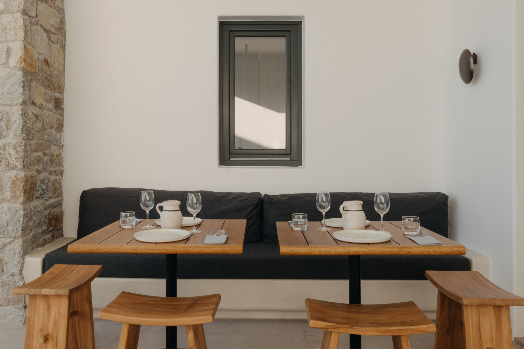 A set dining table at Bard de Sol, laid for a meal
