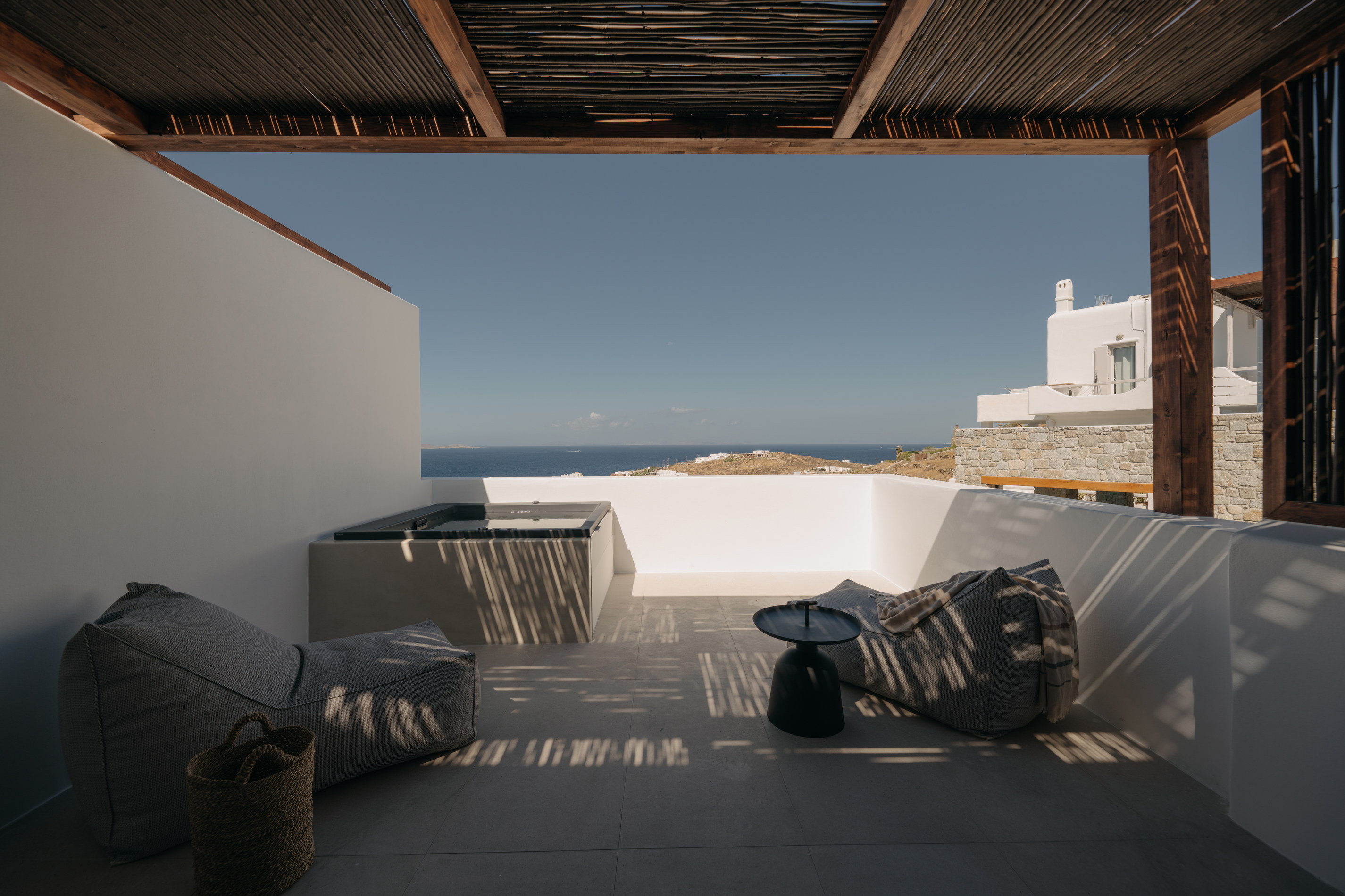A terrace at Bard de Sol overlooking the water on the west coast of Mykonos