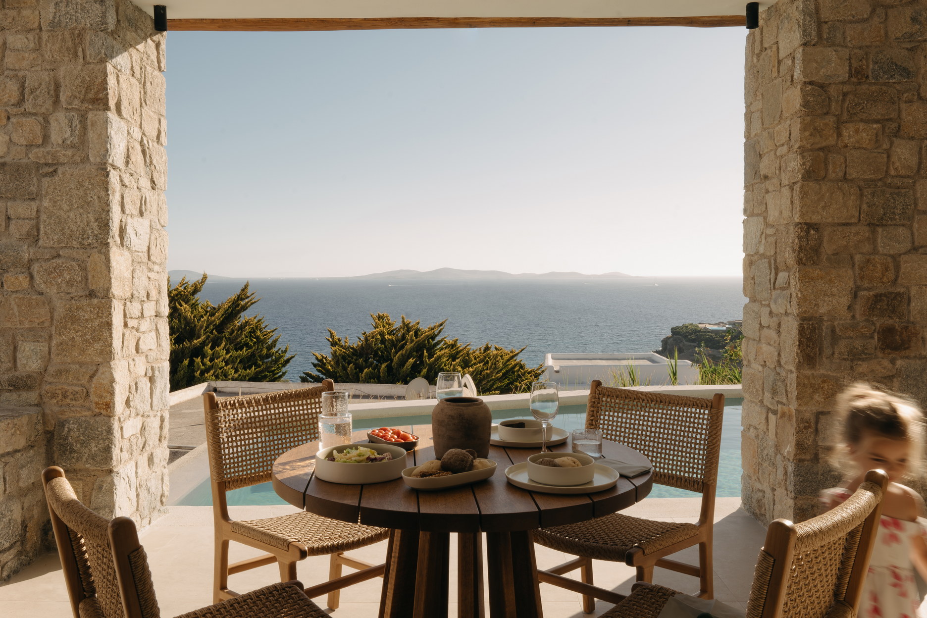 Terrace seating at Bard de Sol looking out across the water on the west coast of Mykonos