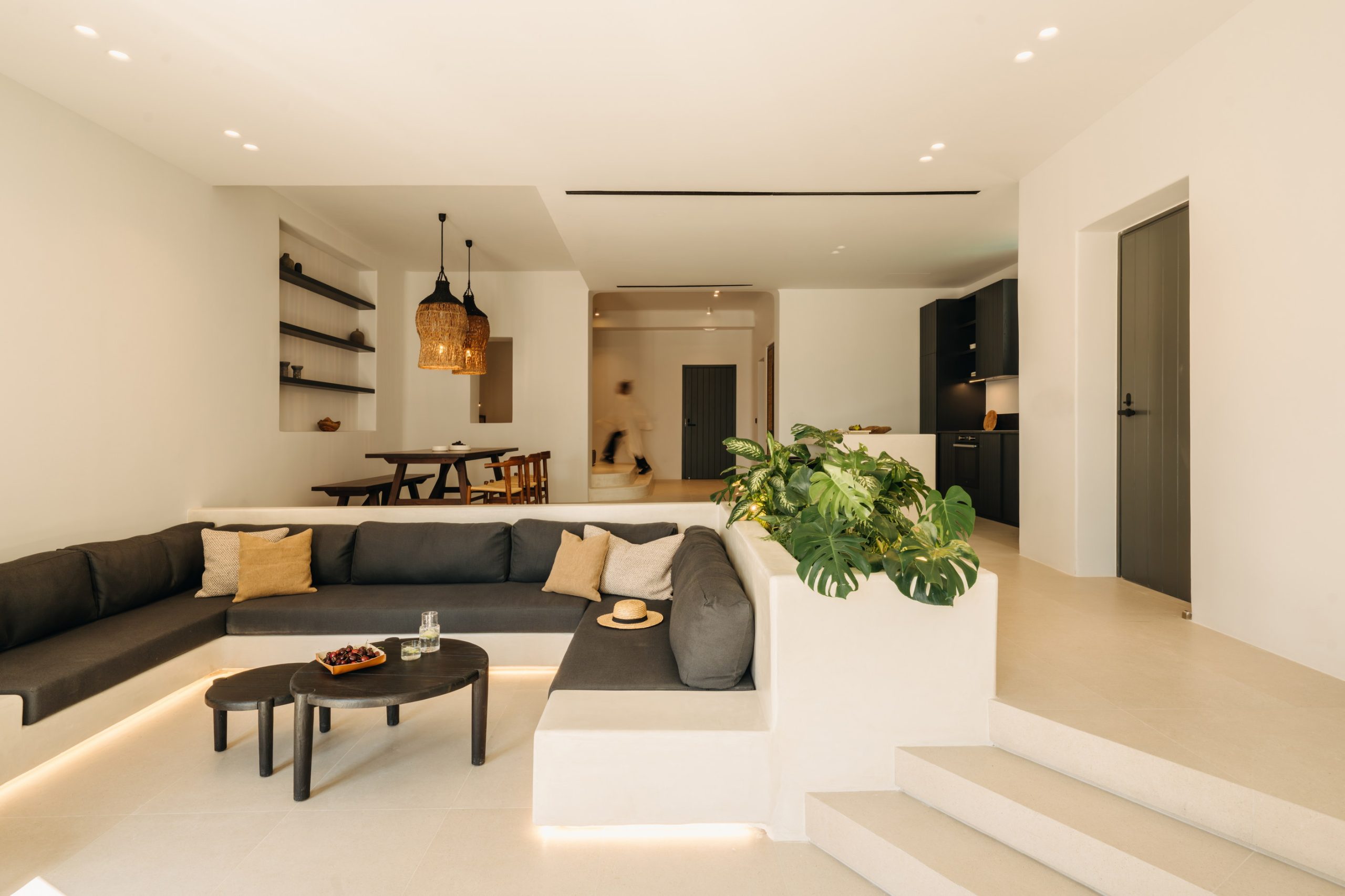 Interior of a boutique suite at Bard de Sol, Mykonos, in warm neutral tones